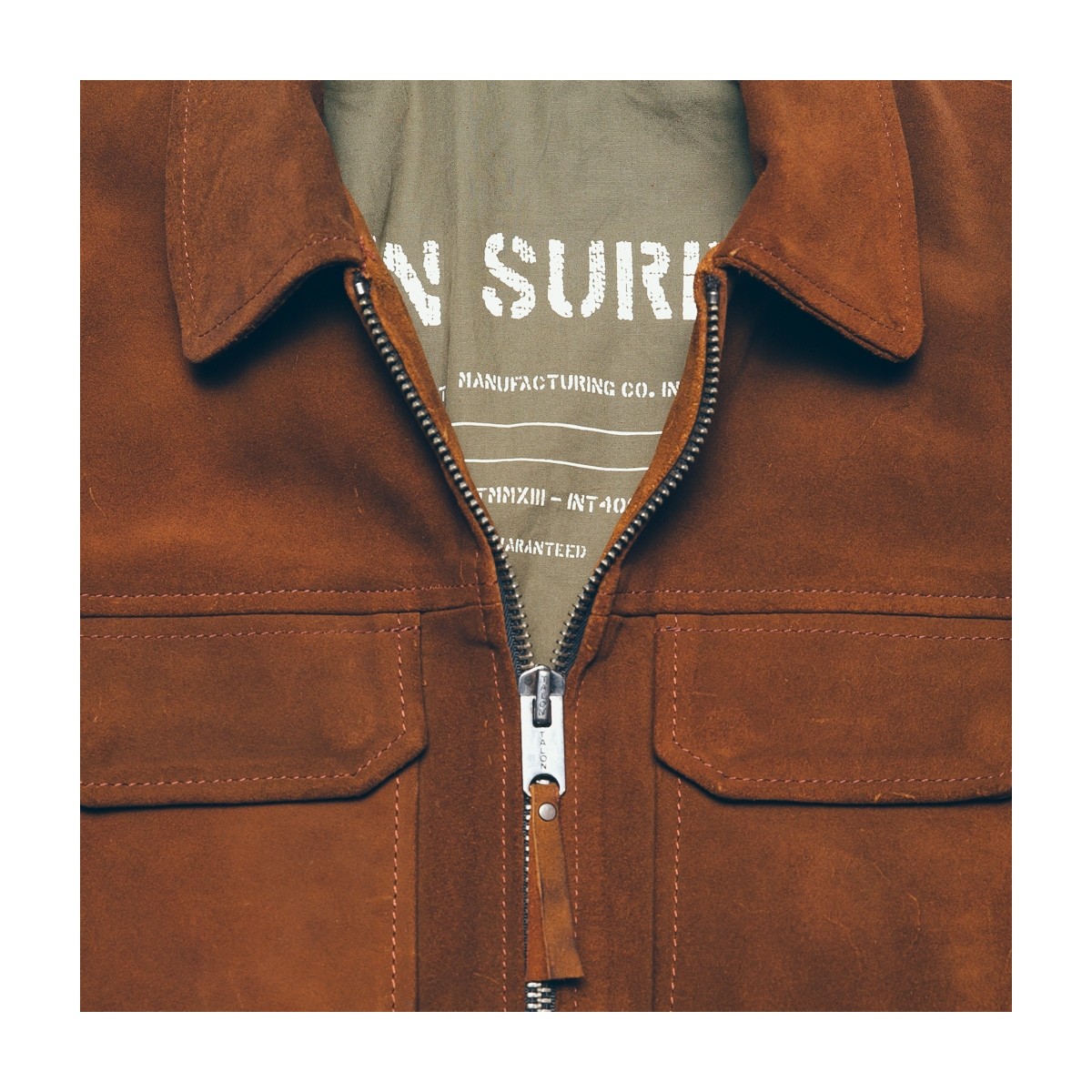 veste-surchemise-en-cuir-marron-detail-poche